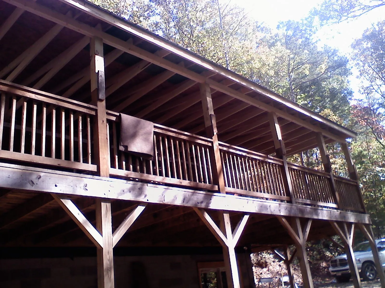 Timber framing under a new elevated porch and deck — Roof Leak Repair in Roslindale by Roofing Brothers